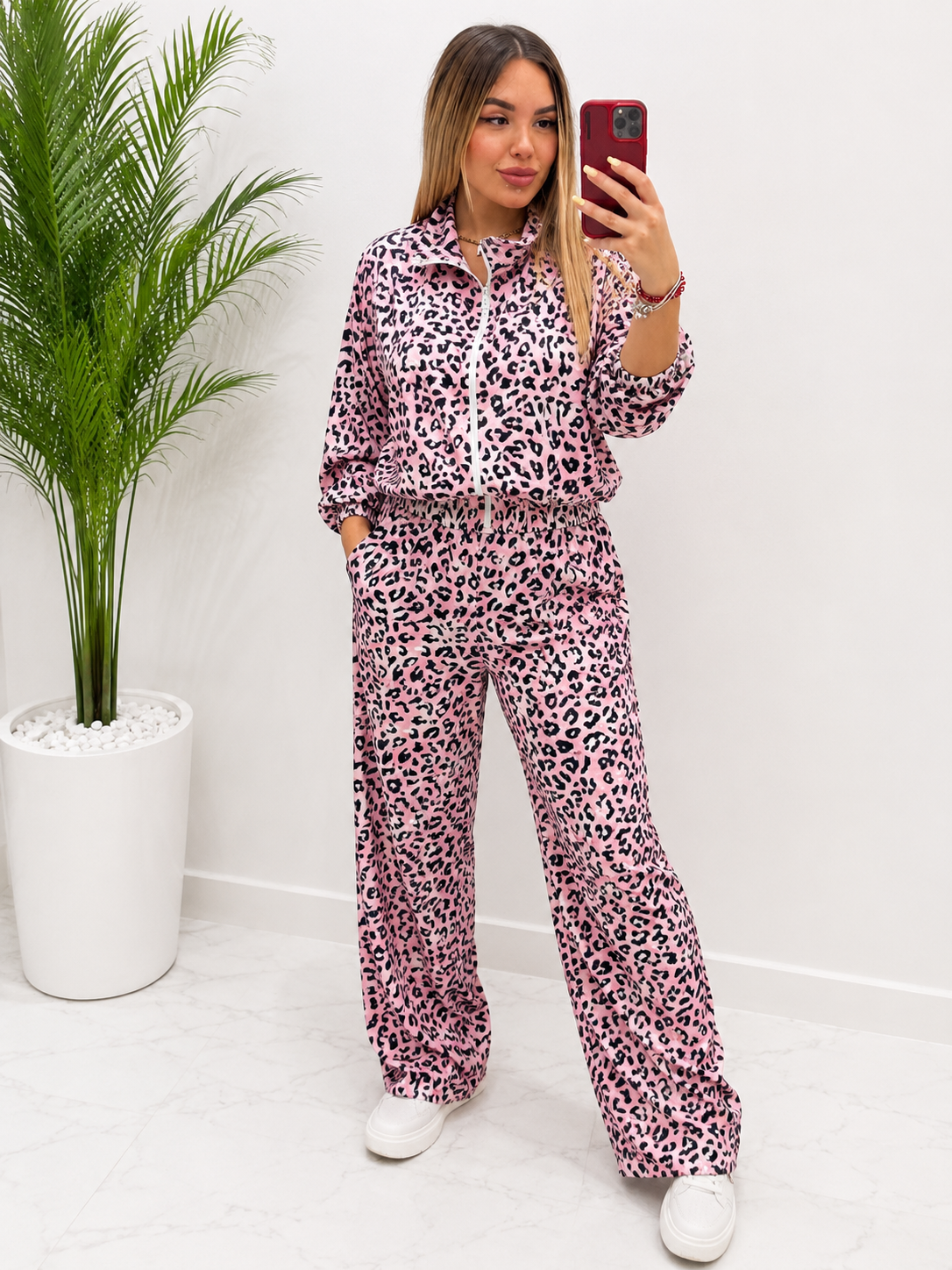 TUTA CON ZIP LEOPARDATA