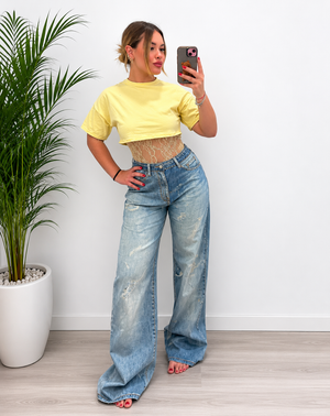 Jeans finti strappi