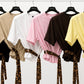 T-SHIRT CROP CON CINTA