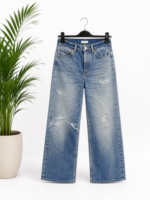 Jeans finti strappi