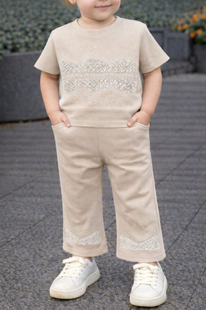 Tuta bimba brillantini